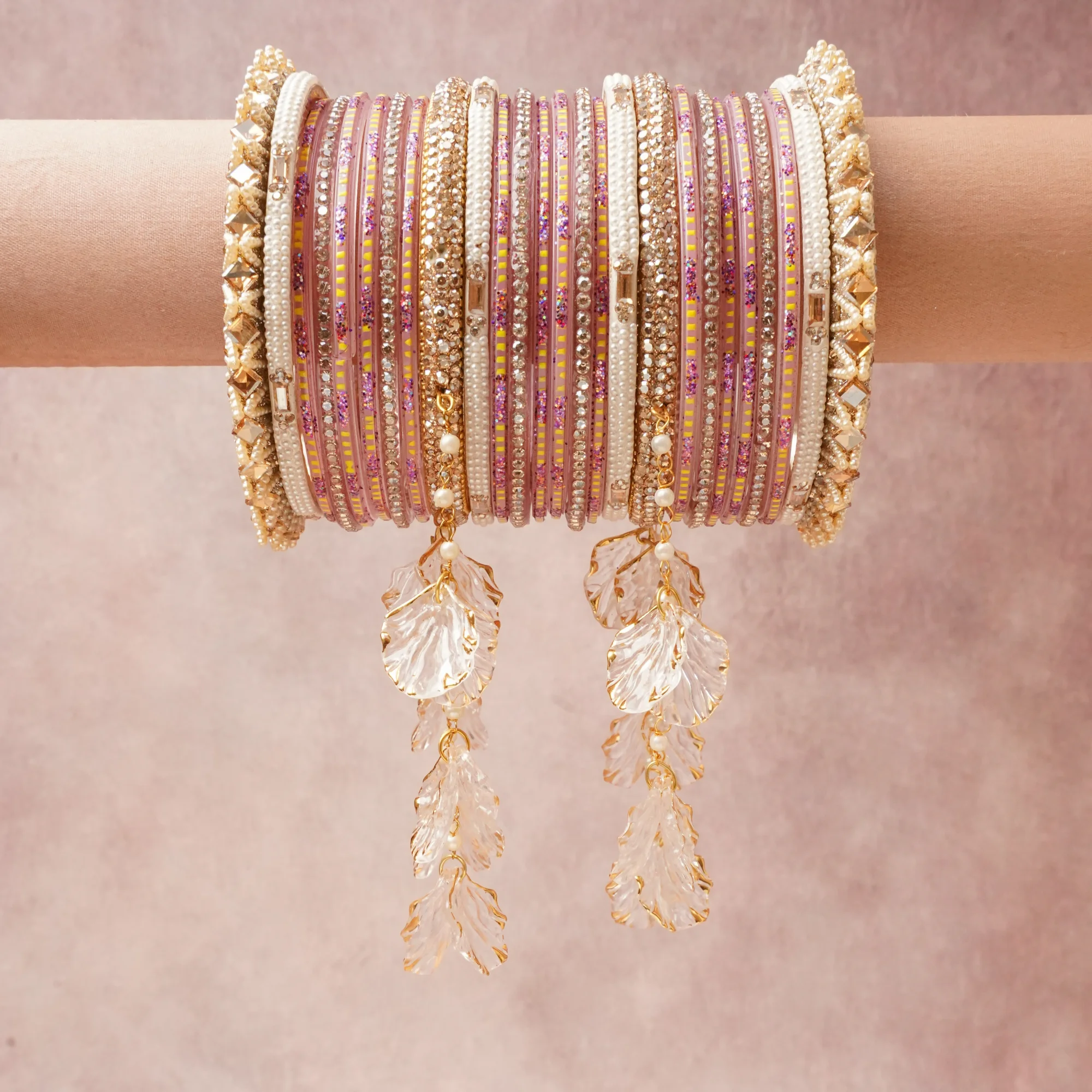 A commanding Muted Rose Pink anchors this beautiful set, enriched with accents of Fuchsia Pink, Clear/Silver that add depth and dimension.

Featuring a striking composition of Glass, Gold-toned Alloy, Faux Pearl, Rhinestone/Crystal, Mirrored Glass, Acrylic/Resin, this set carries intricate craftsmanship and strong presence. Grand in form, it is created for moments that deserve to be marked.